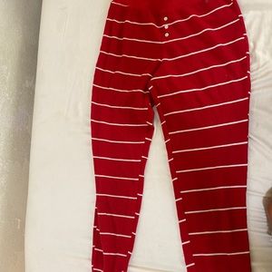 These are red pajama pants with white stripes.